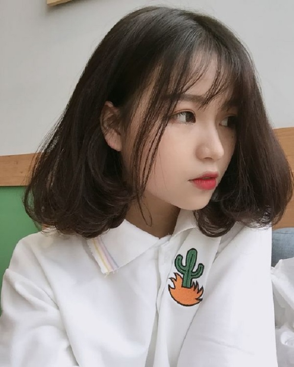 tóc ngắn ép phồng cụp cho mặt tròn