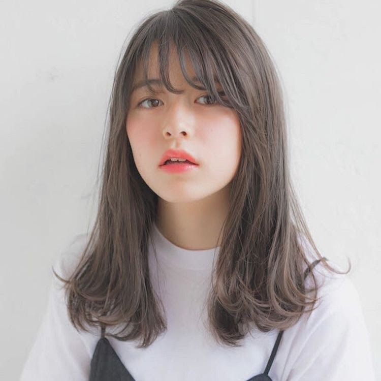 kiểu tóc dài cho mặt tròn