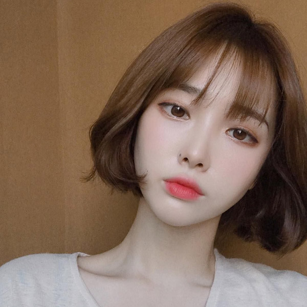 tóc ngắn cho mặt dài uốn cụp