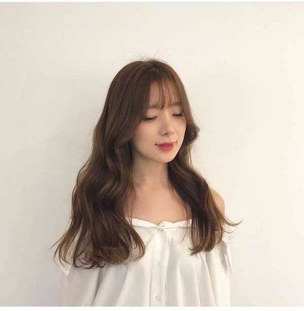 Tóc xoăn sóng lơi - Kiểu tóc phù hợp cho mọi bạn gái